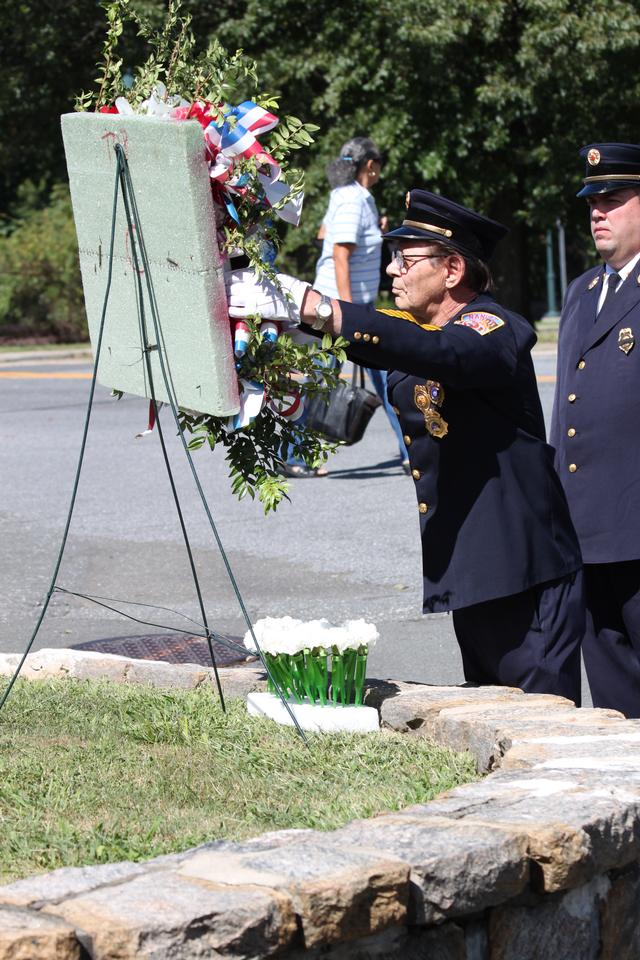 Flower placed for Thomas Simpson by Socky Trojahan

Memorial Service NFD. September 9, 2012. Photo by Vincent P. Tuzzolino